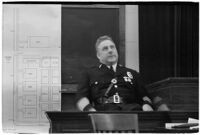 Police Chief James E. Davis testifying before the grand jury about the attempted murder of Harry Raymond, Los Angeles, 1938