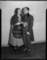 Two opera singers pose for La Boheme at the Shrine Auditorium, Los Angeles, 1935