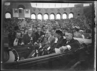 President Franklin D. Roosevelt, accompanied by First Lady Eleanor Roosevelt and Mayor Frank L. Shaw, addresses the crowd at Los Angeles Memorial Coliseum, October 1, 1935