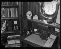 Desk and bookcase in the house of actor John Gilbert, Beverly Hills, 1936