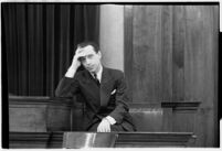 Accused murderer Paul A. Wright on the witness stand, Los Angeles, 1938