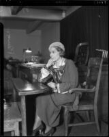 Evangelist Aimee Semple McPherson, photographed at the witness stand