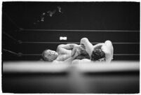 Wrestling heavyweights Gus Sonnenberg and Baptiste Paul grappling at the Olympic, Los Angeles, 1937