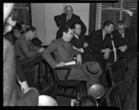 Paul A. Wright with his attorney Jerry Giesler at an inquest for Wright, who is accused of the double murder of his wife and best friend, Los Angeles, November 12, 1937