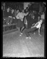 Crowd watching a couple dance in Jitterbug Dance contest Los Angeles, Calif., 1939