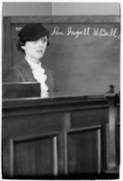 Cafe operator Agnes O'Brien on the witness stand during the liquor license bribe trial, Los Angeles, 1937