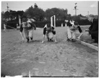 Dean Cromwell coaching new players on the Los Angeles Angels baseball team, Los Angeles, 1940