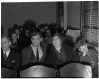Family members of murder victim Marilyn Bunker sit in court during the trial of the accused murderer Donald Rogers, Los Angeles, 1940