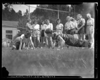 Women applicants for the Los Angeles Police Department during their physical fitness test, circa 1940