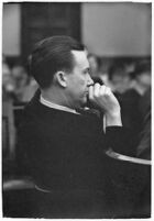 Widower Robert S. James sitting in a courtroom during an inquest involving his wife's death, Los Angeles, 1935