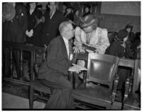 Dr. George K. Dazey and his third wife, Dorcas Dazey, at the trial where Dr. Dazey is accused of the murder of his second wife, Doris S. Dazey, Los Angeles, 1939-1940