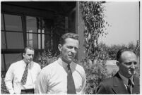 Russian aviators meet the press after breaking the non-stop flight record, flying from Moscow to San Jacinto, CA. July 14, 1937