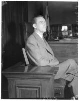 Murder suspect Robert S. James on the witness stand, Los Angeles, 1936