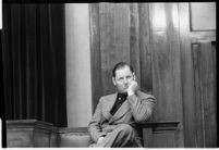 Ambulance driver Harry T. Meredith on the witness stand during the murder trial of Paul A. Wright, Los Angeles, 1938