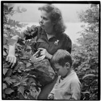 Marge Voigt and son explore the wilderness, Alaska, 1940s