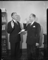 Frank S. Hutton swears Goodwin S. Knight into office, Los Angeles, 1935
