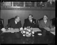 Col. Henry L. Roosevelt speaks with Mayor Frank L. Shaw and Walter J. Braunschweiger at a Chamber of Commerce luncheon, Los Angeles, 1935