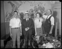 Officer Raymond Greenhill poses with chain letter racketeers, Los Angeles, 1935