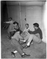 Studio employees playing cards during the Conference of Studio Unions strike against all Hollywood studios, Los Angeles, 1945