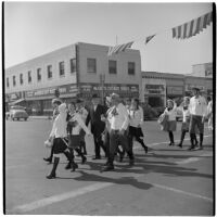 Uniformed participants marching in the post-war Labor Day parade, Los Angeles, 1946