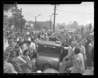 Demonstrators outside of Los Angeles City College campus over Universal Military Training (draft), Calif., 1948