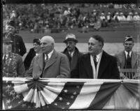 Mayor Shaw and Governor Merriam pose in front of crowd, Los Angeles, between 1933-1939