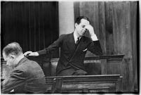 Accused murderer Paul A. Wright on the witness stand, Los Angeles, 1938