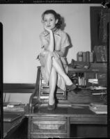 Actress Evelyn Poe poses after her film contract is approved, Los Angeles, 1935