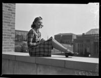 Janice Lipking, a Zeta Tau Alpha sorority sister at UCLA, posing on a ledge, Los Angeles, late 1930s