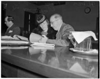 Dr. George K. Dazey and his third wife, Dorcas Dazey, at the trial where Dr. Dazey is accused of the murder of his second wife, Doris S. Dazey, Los Angeles, 1939-1940