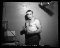 Chris Arnold, muscle man and wrestler in 1947