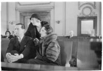 Actor Ben Lyon, his wife, actress Bebe Daniels, and their friend, actress Doris Kenyon, during a trial for Albert F. Holland, who wrote 150 love letters to Daniels, Los Angeles, 1933