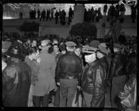 Police officers control crowd of strikers during Douglas Aircraft Corporation strike, Santa Monica, 1937