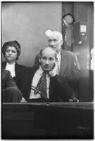 Members of the Albert Dyer murder trial jury standing outside with a police officer, Los Angeles, August 1937