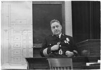 Police Chief James E. Davis testifying before the grand jury about the attempted murder of Harry Raymond, Los Angeles, 1938