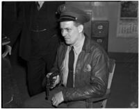 Police officer A.H. Miller turns in his gun and badge, Los Angeles, 1940