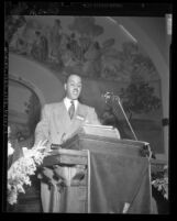 Roy Wilkins at podium, speaking at 10th Annual Convention of the NAACP in Los Angeles, Calif., 1949