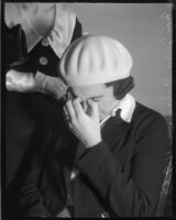 Policewoman Jean Peirce in tears, Los Angeles, circa December 1935