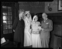 Red Cross nurses pose with secretary and D.C. Quatters, Los Angeles, 1935