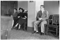 Private detective Pearl Antibus appears in court with her daughter Norma Thelan and son Robert Antibus during her trial against millionaire Thomas W. Warner, Sr, Los Angeles, 1938