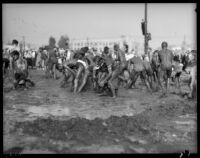 Los Angeles Junior College students in yearly mud battle, February 1936