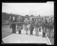 Governor Olson and Tournament of Roses Queen Sally Stanton at dedication of Arroyo Seco Parkway, Los Angeles, 1940