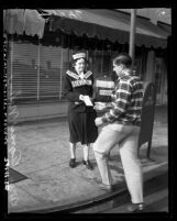 Mrs. Agnes Nolen covered in "Stevenson" stickers, campaigning for Adlai E. Stevenson during presidential election Los Angeles, 1952