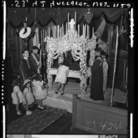 Children observing Easter rites at Hellenic Orthodox Church of Annunciation in Los Angeles, Calif., 1951