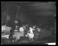 Prostitutes at a bar on Main Street in Los Angeles, Calif., circa 1949