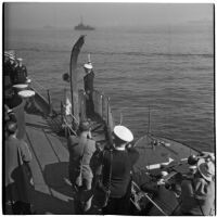 Admiral William F. Halsey waves farewell aboard the U.S.S. South Dakota during his retirement ceremony, Los Angeles, 1945