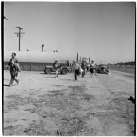 Veterans arrive at Port Hueneme for a Quonset hut and surplus military supply sale, Port Hueneme, July 15, 1946