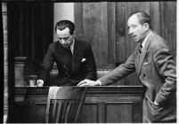 Accused murderer Paul A. Wright being questioned in court, Los Angeles, 1938
