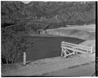 Flood basins above Altadena filled with rainwater. Circa February 15, 1936