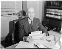 Judge Stanley Moffatt at his desk, Huntington Park